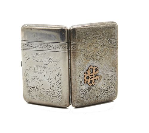 Russian silver and gold cigarette case 19th century Russian silver and gold cigarette case.

3 5/8" H  x 2 1/2" W x 1/2" D closed.
