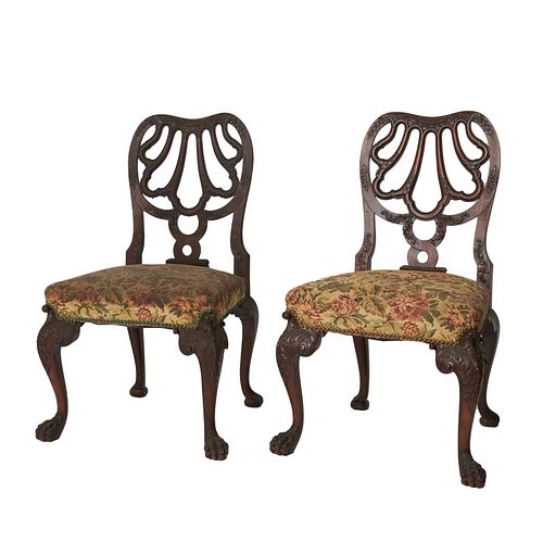2 English George II style Mahogany w/ upholstered 2 English George II style Mahogany over upholstered side chairs raised on carved and molded cabriole
