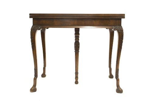 English Georgian style mahogany drop leaf 5 legged English Georgian style mahogany drop leaf 5 legged Dining table raised on cabriole legs with carved