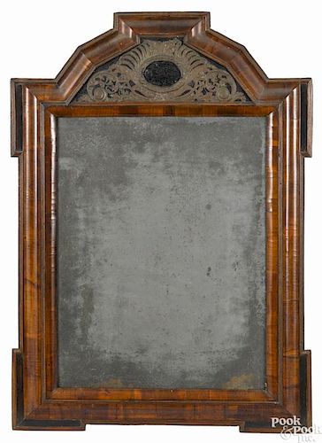 Large Dutch pillow mirror, early 18th c., the crest with an inset embossed brass plaque, 33'' x 23''