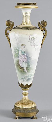 French ormolu mounted porcelain urn, late 19th c., decorated with a young maiden and cherub