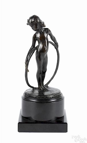 Patinated bronze girl with a hoop, 20th c., monogrammed on base, 7 1/4'' h.