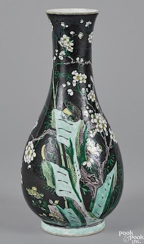 Chinese export famille noir ovoid vase with a prunus tree and birds, 13 1/4'' h.