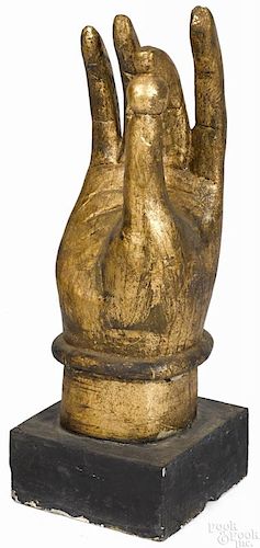Oriental carved and gilded hand, possibly a Mudra pose, 26'' h.