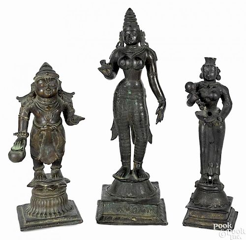 Three Indian bronze Buddhist figures, 18 1/2'' h., 14'' h., and 13 1/2'' h.