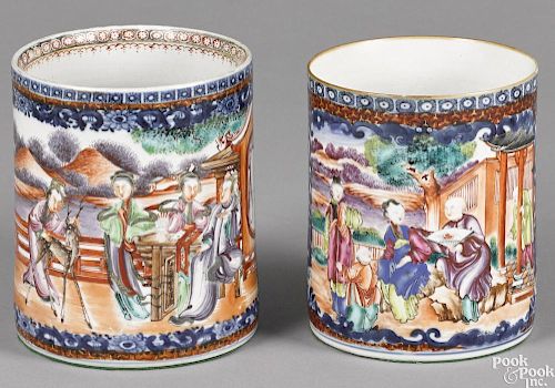 Two similar large Chinese export porcelain Mandarin palette mugs, early 19th c., 5 1/2'' h.