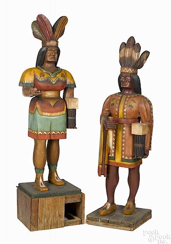 Pair of carved and painted cigar store figures, mid 20th c., of an Indian brave and maiden, 70'' h.