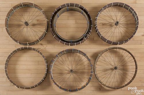 Twenty-three wood rim bicycle tires, late 19th/early 20th c., to include eight metal clad