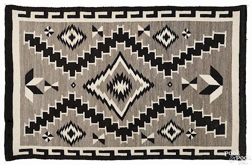 Navajo weaving, early 20th c., 71'' x 44 1/2''.