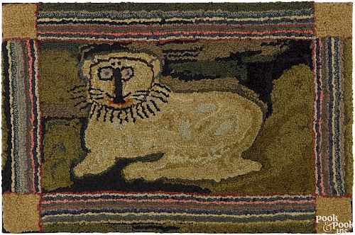 American hooked rug, early 20th c., with a lion, 26'' x 40 1/2''.