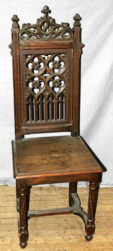 CATHEDRAL STYLE HAND CARVED OAK CHAIR