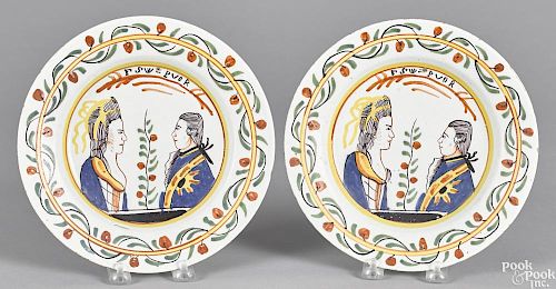 Pair of Delft plates, mid 18th c., each with a bust-length portrait of Prince William & Mary II