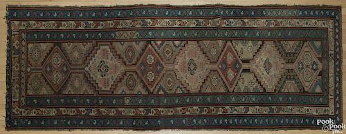 Caucasian long rug, early 20th c., 9'3'' x 3'5''.