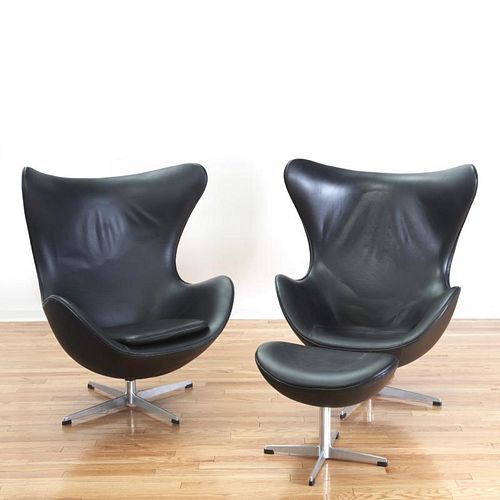 Pair black leather Egg chairs after Arne Jacobsen