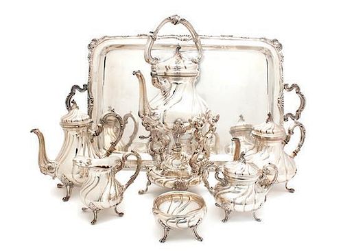 A Peruvian Silver Tea and Coffee Service, Camusso Height of first over handles 18 1/2 inches.