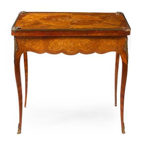 A Louis XV Style Gilt Metal Mounted Marquetry Game Table Height 30 x width 31 3/4 x depth 21 3/4 inches.