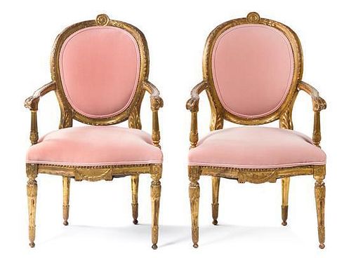 A Pair of Louis XVI Style Giltwood Fauteuils Height 39 1/2 inches.