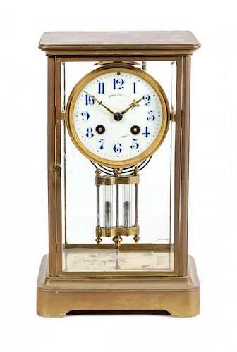 * A French Brass and Glass Crystal Regulator Clock Height 11 3/4 inches.
