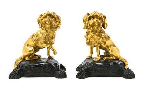 * A Pair of Continental Gilt and Patinated Bronze Models of Spaniels Height 8 1/4 inches.