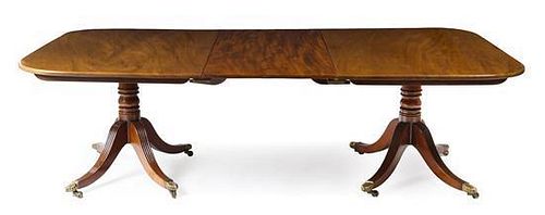 * A George III Style Mahogany Double Pedestal Dining Table Height 28 x depth 55 inches.