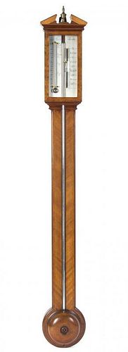 * An English Mahogany Stick Barometer Height 39 inches.