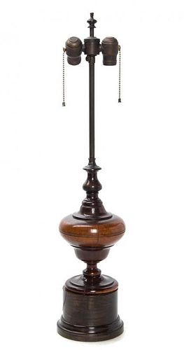 * An English Turned Wood Urn Height overall 29 1/4 inches.