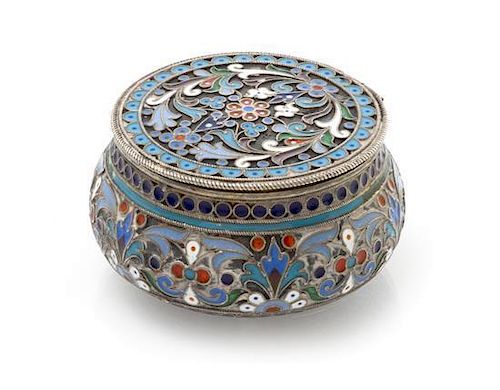* A Russian Silver and Enamel Snuff Box, Maker's mark obscured, Moscow, late 19th/early 20th century, of circular form, the case