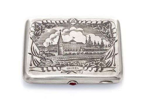 * A Soviet Russian Niello Silver Cigarette Case, Maker's mark Cyrillic AMYu, Moscow, 20th century, the lid with an image of the
