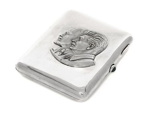 * A Russian Silver Cigarette Case, Soviet maker's mark, Kiev, 20th Century, the lid worked to show the profiles of Lenin and Sta