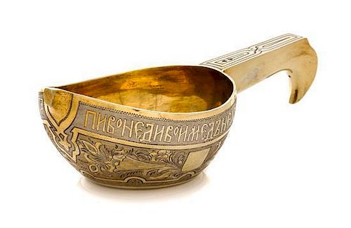 * A Russian Silver-Gilt Kovsh, Mark of Andrei Vekman, assay mark of V. Savinsky, Moscow, 1875, the body decorated with a Cyrilli