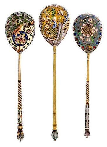 * A Group of Three Russian Silver-Gilt and Enamel Spoons, Mark of 11th Artel, Moscow, early 20th century, each having an enamele