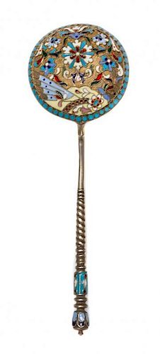 * A Russian Enameled Silver Spoon, Maker's mark obscured, Moscow, the back of the circular bowl worked with flower heads against