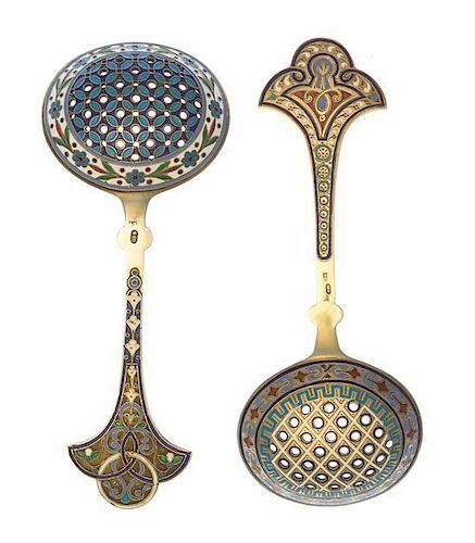 * Two Russian Silver-Gilt and Enamel Tea Strainers, Marks likely of Antip Kuzmichev, Moscow, late 19th century, each with a flar