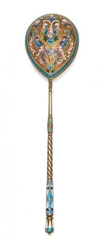 * A Russian Silver-Gilt and Enamel Spoon, Mark of D. Nikitin, Moscow, early 20th century, having a polychrome enamel finial on a
