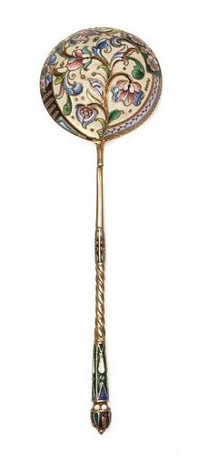 * A Russian Silver-Gilt and Enamel Spoon, Mark of Konstantin Skortisov, Moscow, early 20th century, having a green and purple en