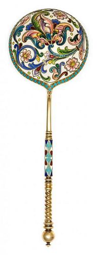 * A Russian Silver-Gilt and Enamel Spoon, Mark of 11th Artel, Moscow, early 20th century, having a spherical finial on a twist h