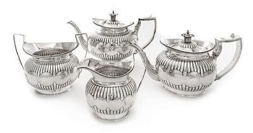 * A George III Silver Four-Piece Tea Set, Daniel Pontifex, London, 1802-03, comprising a large teapot, smaller teapot, creamer a