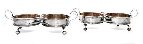 * A Pair of George III Silver Two-Bottle Wine Trollies, Philip Bachelor, London, 1792, each with wood centers and raised on four