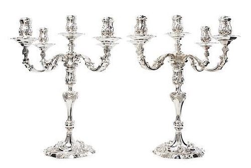 A Pair of Elizabeth II Silver Five-Light Candelabra, Garrard & Co. Ltd., London, 1969, the candle cups of baluster form with roc
