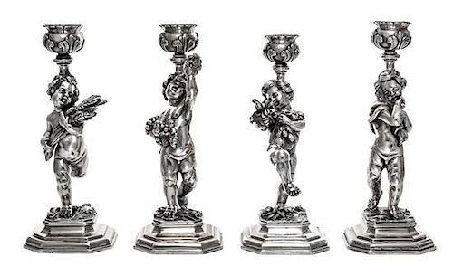 * A Set of Four Italian Silver Figural Candlesticks, Ugo Bellini, Florence, 20th Century, each in the form of a putto allegorica