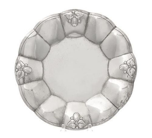 * An American Silver Dish, Tiffany & Co., New York, NY, First half 20th century, having scalloped edges with foliate and berry e