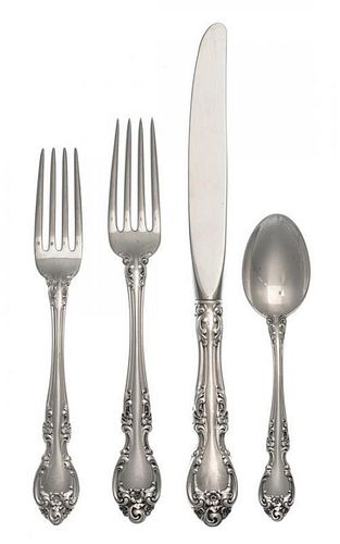 An American Silver Flatware Service, Gorham Mfg. Co., Providence, RI, Melrose pattern, comprising: 12 dinner knives 12 dinner fo