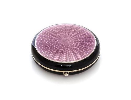 * An American Silver and Guilloche Enamel Compact, , of circular form, the case decorated with lavender sunburst guilloche round
