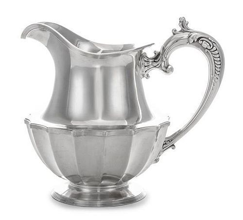 * An American Silver Small Pitcher, Frank W. Smith Silver Co., Gardner, MA, of baluster form with a paneled lower body.