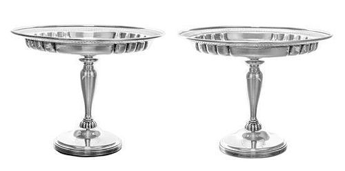 * A Pair of American Silver Compotes, Redlich & Co., New York, NY, the partly lobed circular bowls with pierced borders, raised