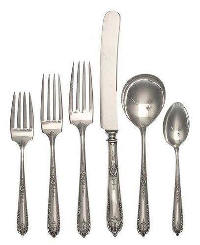 An American Silver Flatware Service, Alvin Mfg. Co,. Providence, RI, comprising: 12 dinner knives 12 dinner forks 12 luncheon fo