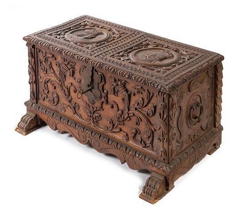 * A Renaissance Revival Carved Walnut Chest Width 34 1/4 inches.