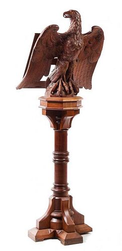 A Carved Walnut Choir Stand Height 69 inches.