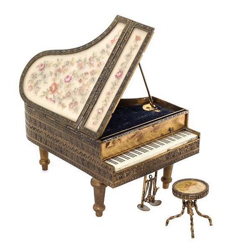 * A Piano Form Music Box Height 3 3/4 inches.