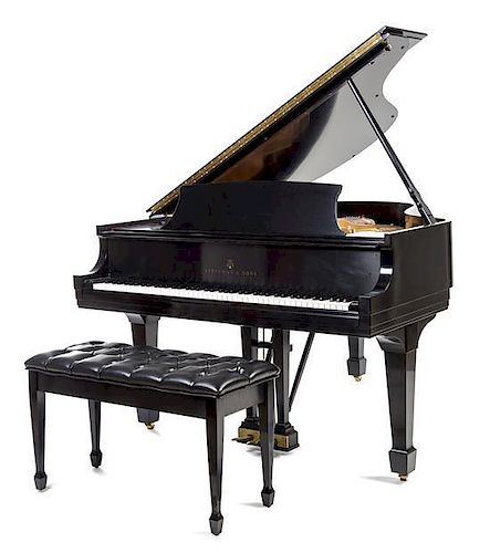 * A Steinway and Sons Baby Grand Piano Length 66 inches.
